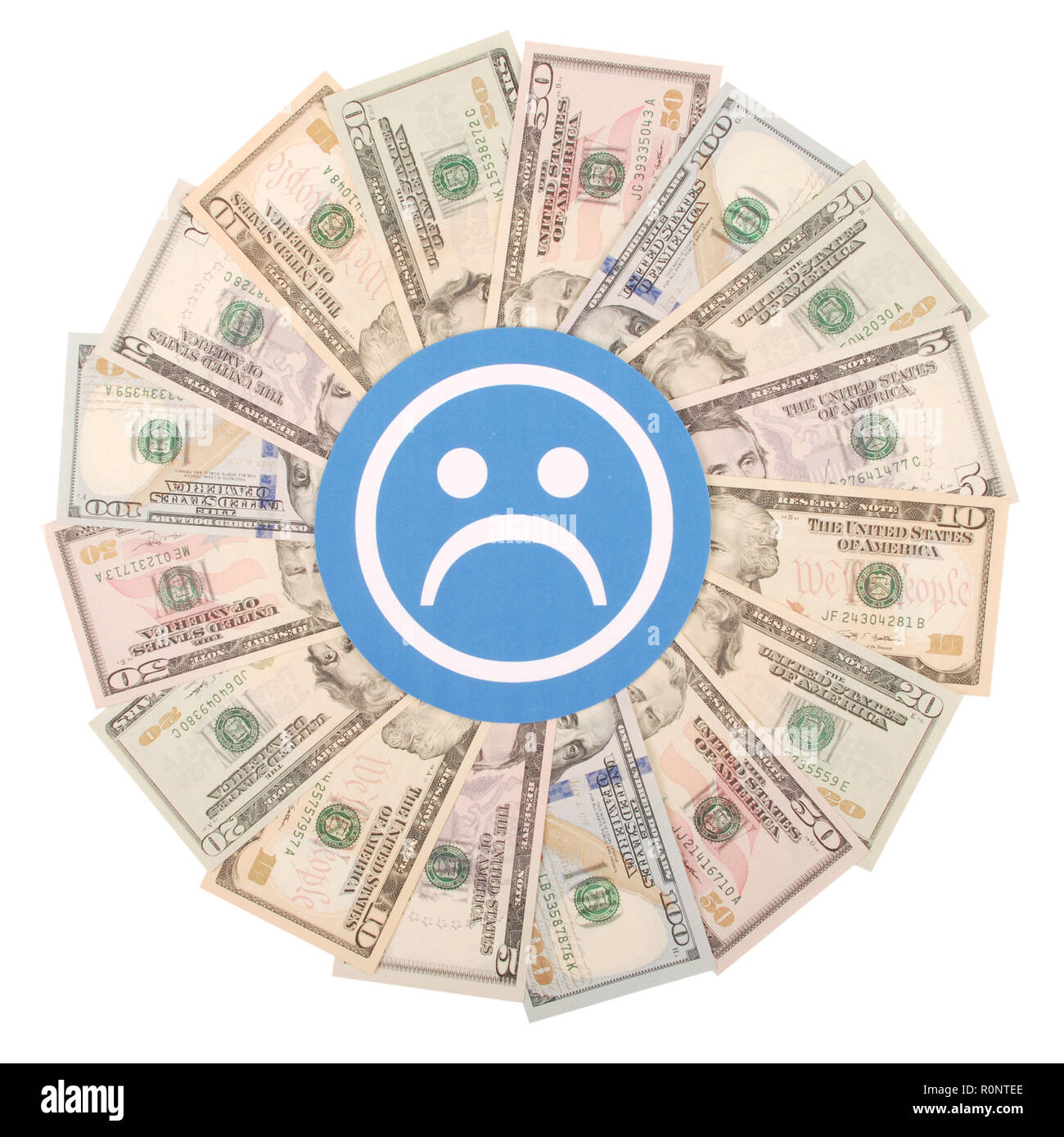 Blue sad smile faces on mandala kaleidoscope from money. Abstract money background raster pattern repeat mandala circle. Stock Photo