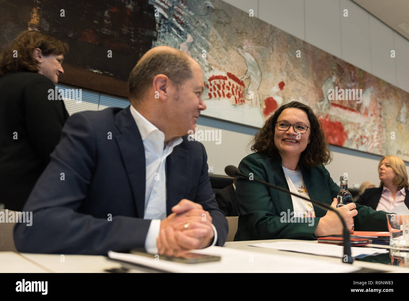 The leader of the Social Democratic Party (R, SPD) Andrea Nahles talks to Federal Minister of Finance, Olaf Scholz of the Social Democratic Party (SPD) before the SPD faction meeting. Stock Photo