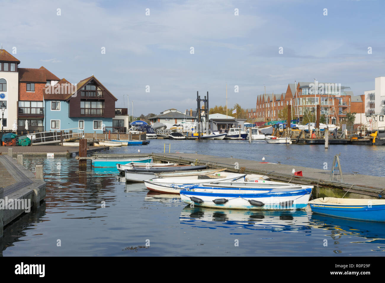 Lymington Harbour, Lymington, Hampshire, UK, with boats and buildings