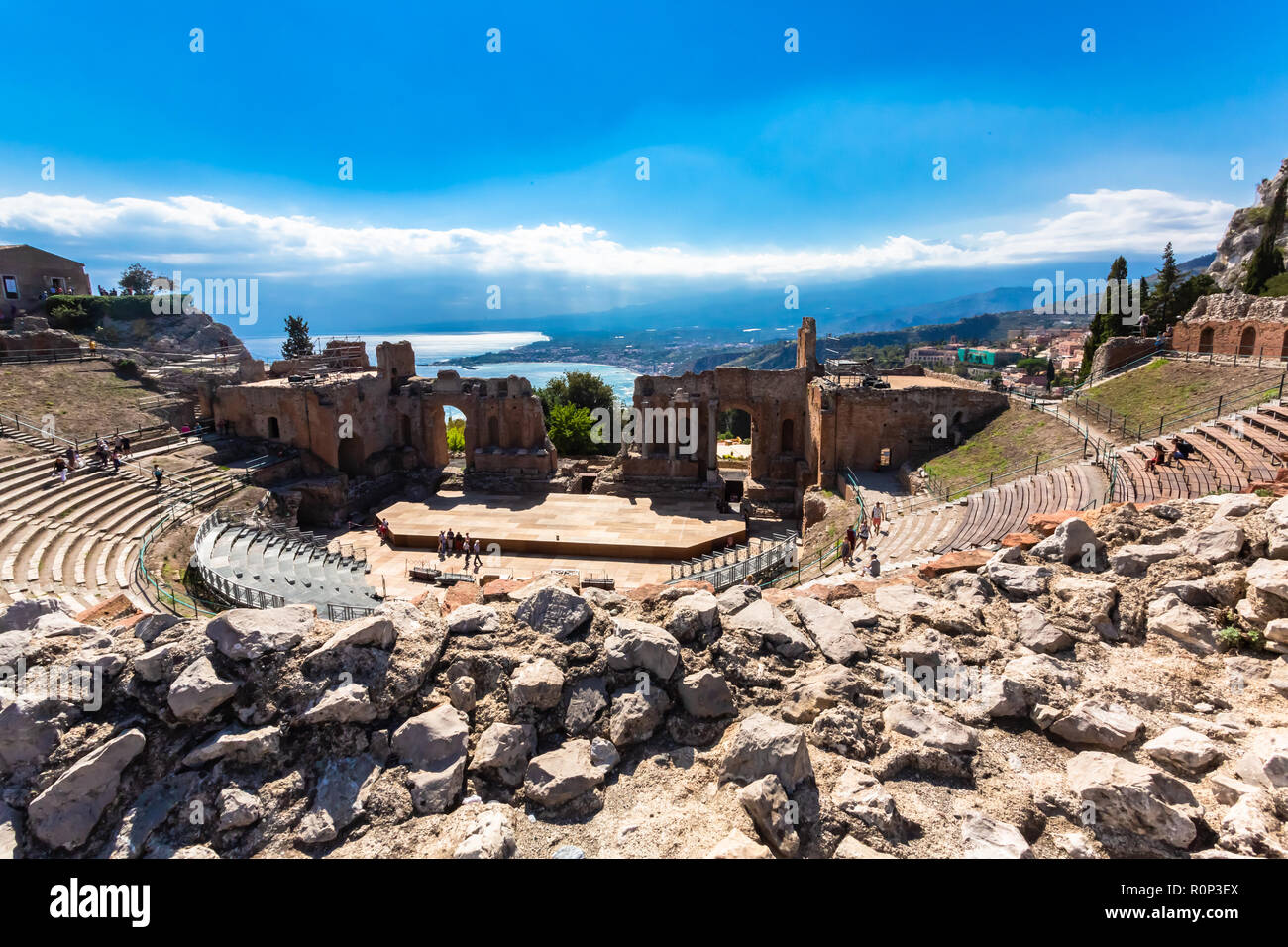 Taormina, Italy - September 26, 2018: Ruins of the ancient greek theater of Taormina, Sicily, Italy. Stock Photo