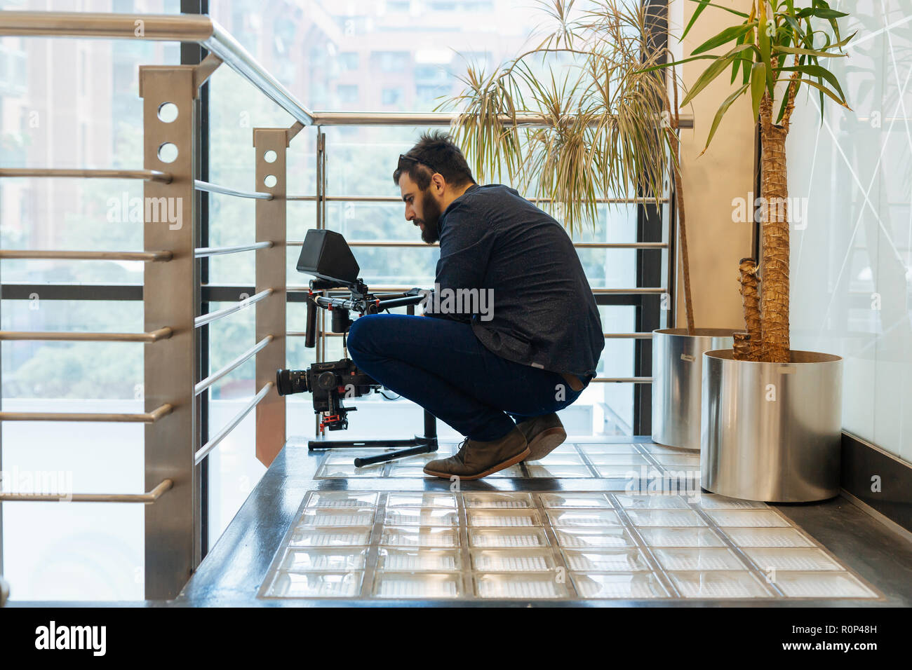 Professional news cameraman isolated hi-res stock photography and ...