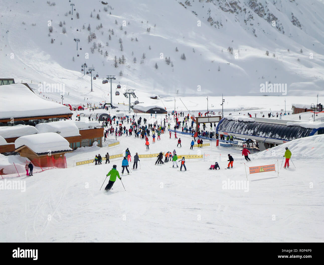 Ski station of Tignes in winter, departure of the ski lifts Stock Photo