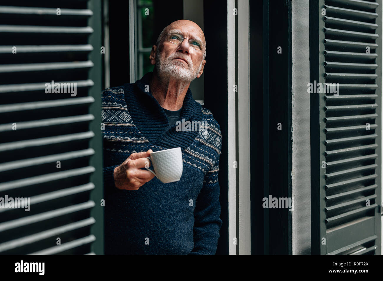 Young man at the window stock photo. Image of casual - 30207172