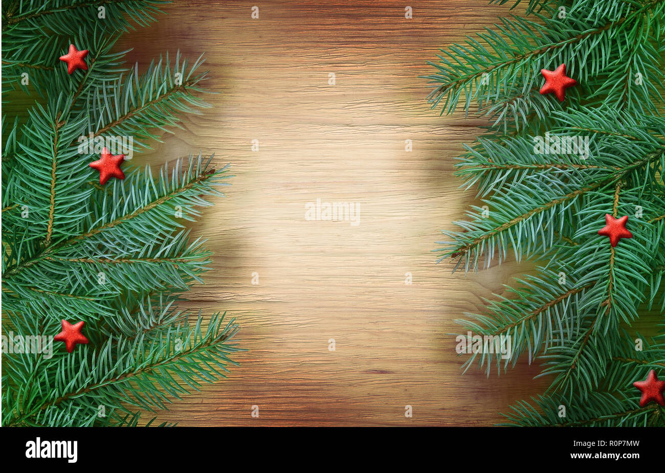 Christmas wooden background with fir tree and decoration star. Top view ...