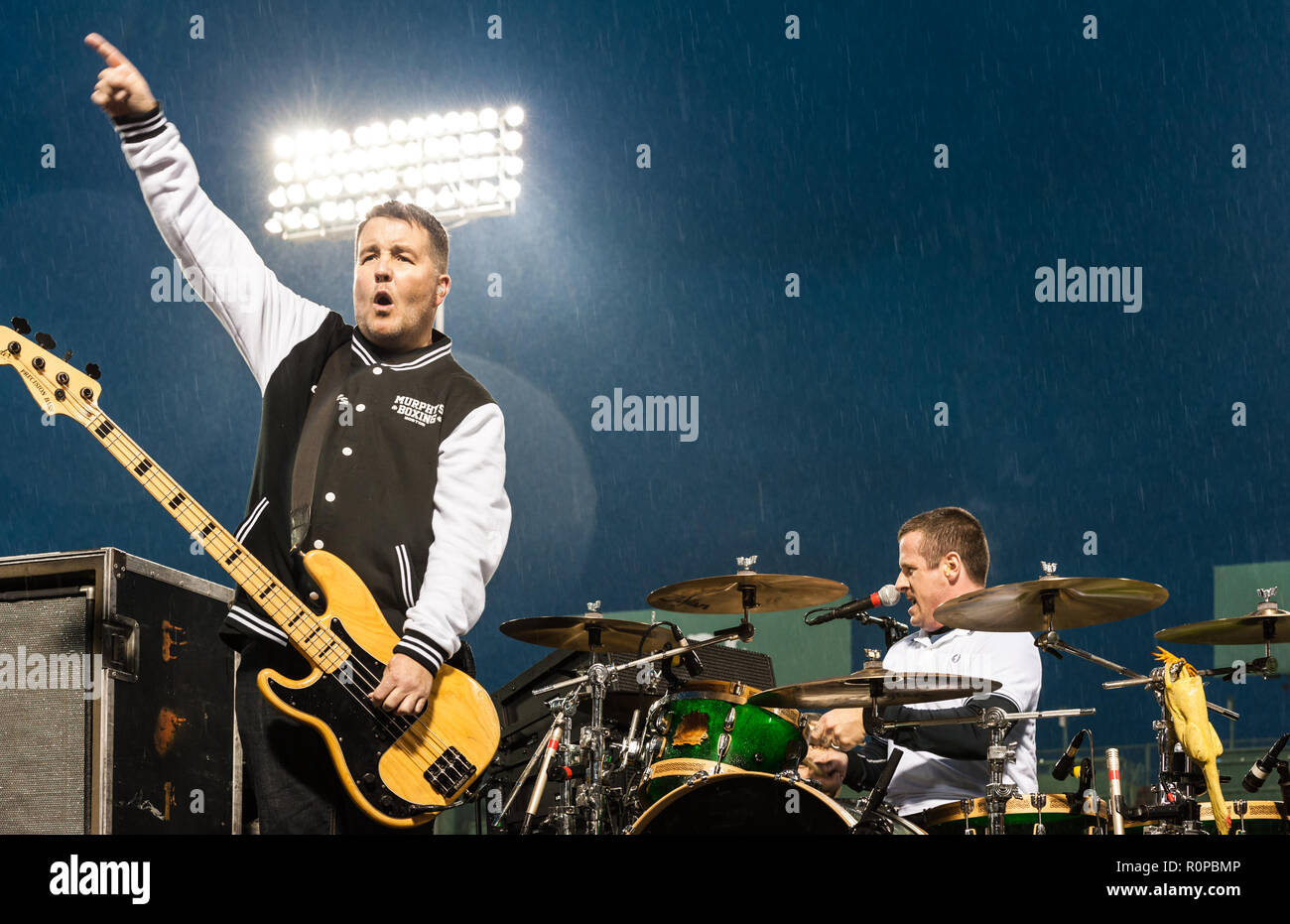 Ken Casey (lead guitarist) and Matt Kelly (drummer) performing with the