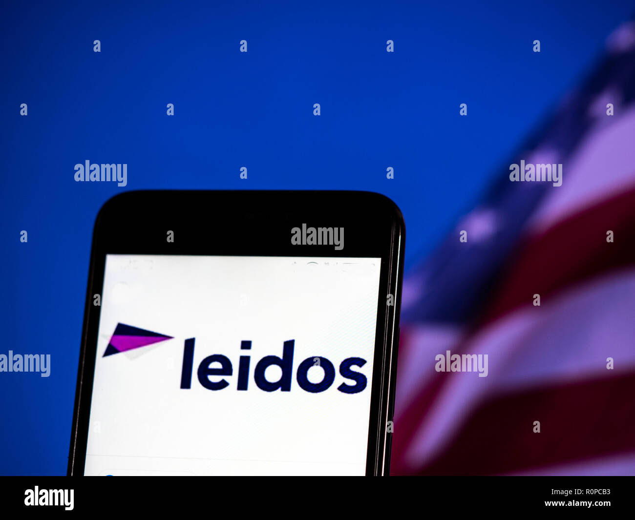 Leidos Scientific research company logo seen displayed on smart phone. Leidos, formerly known as Science Applications International Corporation, is an American defense, aviation, information technology, and biomedical research company, that provides scientific, engineering, systems integration, and technical services Stock Photo