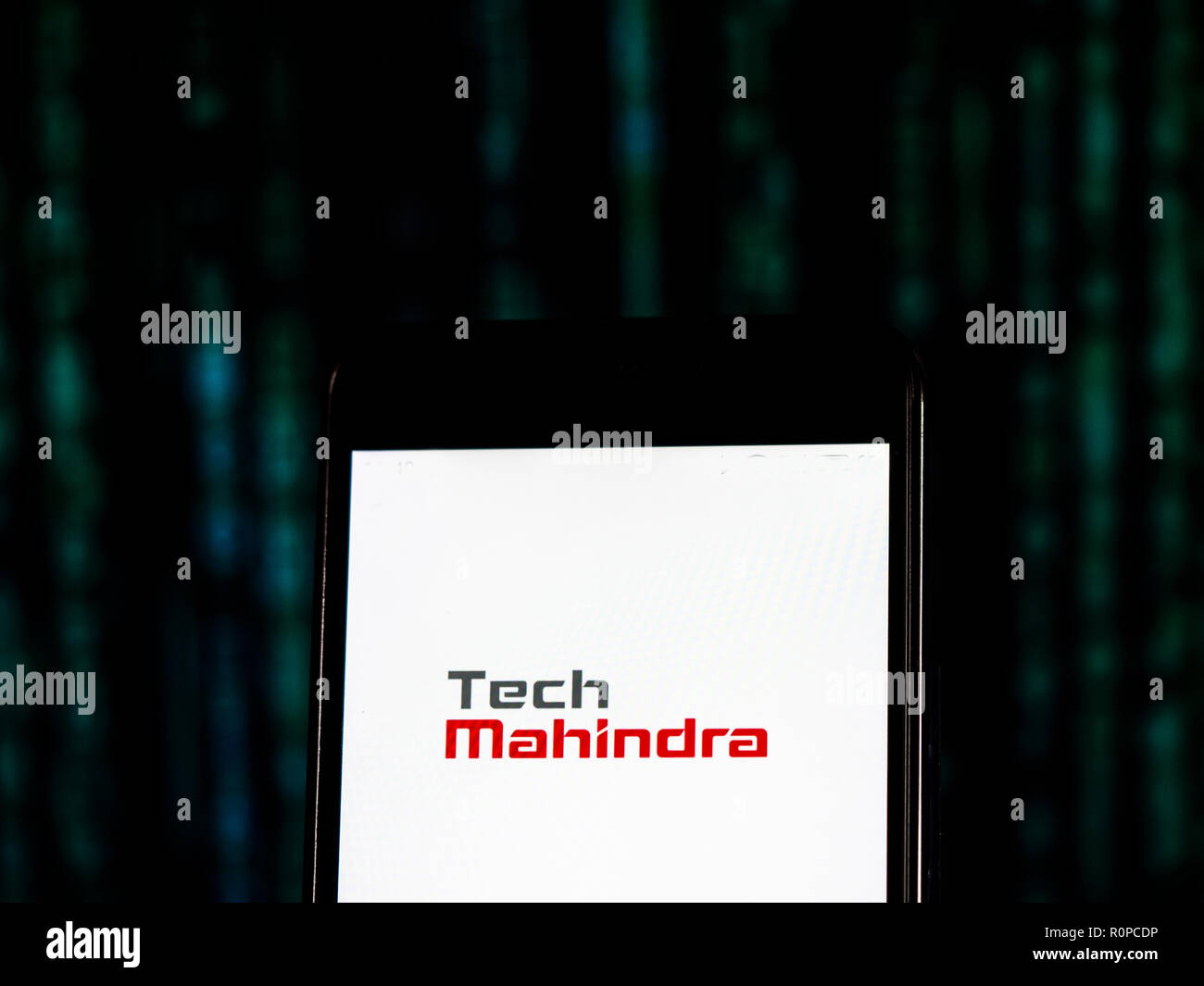 Tech Mahindra Information technology company logo seen displayed on smart phone. Tech Mahindra Limited is an Indian multinational provider of information technology, networking technology solutions and Business Process Outsourcing to various industry verticals and horizontals. Stock Photo