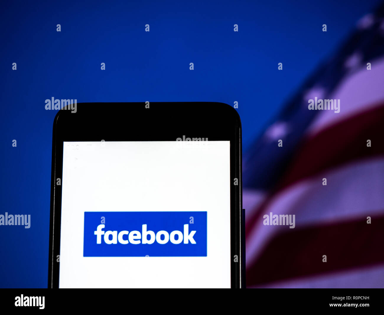 Facebook logo seen displayed on smart phone. Stock Photo
