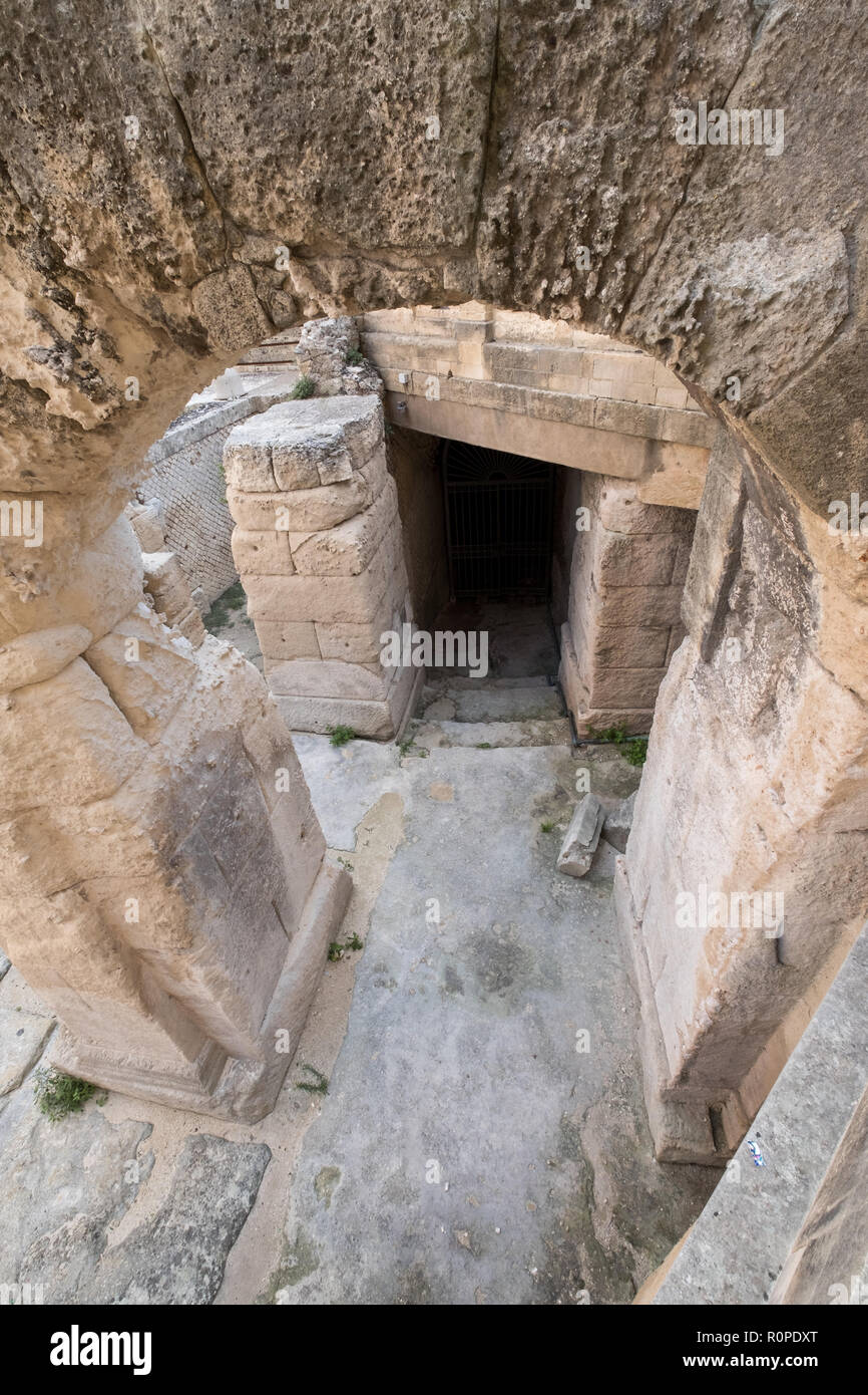 Remains of Roman amphitheatre in Piazza Sant'Oronzo, in the centre of the historic city of Lecce, Puglia, Southern Italy. Stock Photo