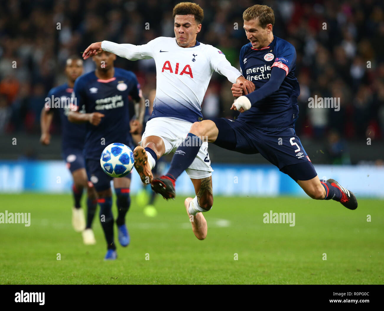 London, England, 06th November 2018.  L-R Tottenham Hotspur's Dele Alli and Daniel Schwaab of PSV Eindhoven  during Champion League Group B between Tottenham Hotspur and PSV Eindhoven at Wembley stadium , London, England on 06 Nov 2018. Credit Action Foto Sport  FA Premier League and Football League images are subject to DataCo Licence. Editorial use ONLY. No print sales. No personal use sales. NO UNPAID USE Credit: Action Foto Sport/Alamy Live News Stock Photo