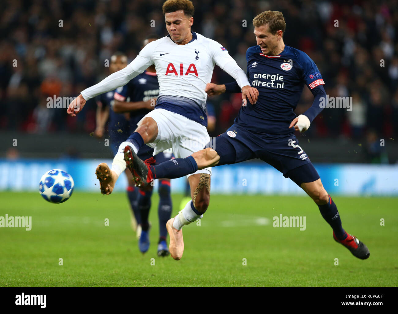 London, England, 06th November 2018.  L-R Tottenham Hotspur's Dele Alli and Daniel Schwaab of PSV Eindhoven  during Champion League Group B between Tottenham Hotspur and PSV Eindhoven at Wembley stadium , London, England on 06 Nov 2018. Credit Action Foto Sport  FA Premier League and Football League images are subject to DataCo Licence. Editorial use ONLY. No print sales. No personal use sales. NO UNPAID USE Credit: Action Foto Sport/Alamy Live News Stock Photo