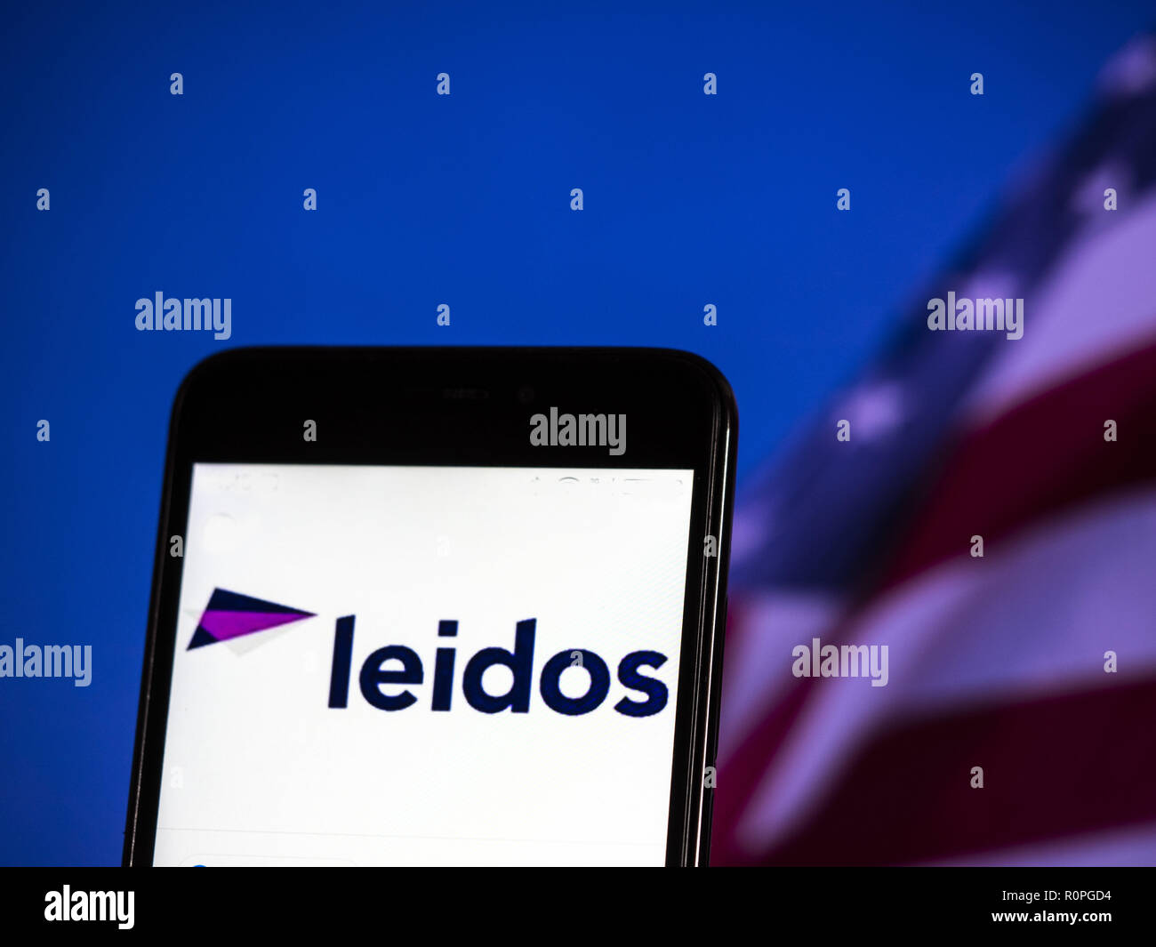 Kiev, Ukraine. 6th Nov, 2018. Leidos Scientific research company logo seen displayed on smart phone. Leidos, formerly known as Science Applications International Corporation, is an American defense, aviation, information technology, and biomedical research company, that provides scientific, engineering, systems integration, and technical services Credit: Igor Golovniov/SOPA Images/ZUMA Wire/Alamy Live News Stock Photo