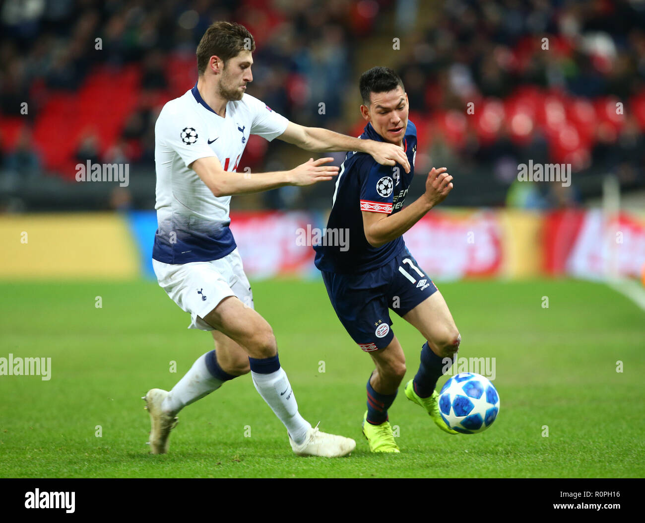 London, England, 06th November 2018.  L-R Tottenham Hotspur's Ben Davies and Hirving Lozano of PSV Eindhoven during Champion League Group B between Tottenham Hotspur and PSV Eindhoven at Wembley stadium , London, England on 06 Nov 2018. Credit Action Foto Sport  FA Premier League and Football League images are subject to DataCo Licence. Editorial use ONLY. No print sales. No personal use sales. NO UNPAID USE Credit: Action Foto Sport/Alamy Live News Stock Photo