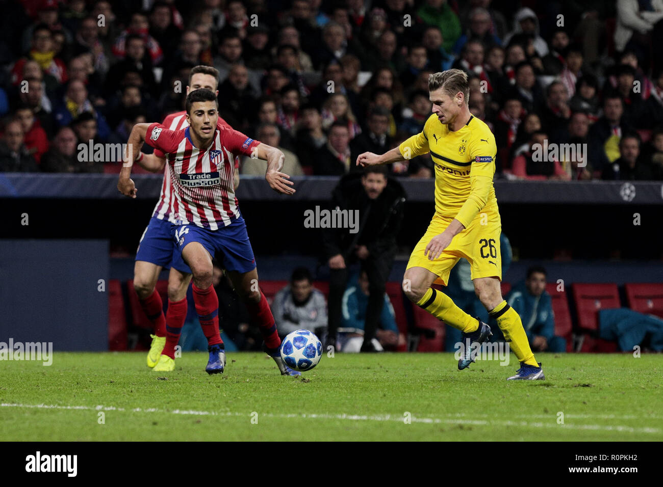 Madrid, Madrid, Spain. 6th Nov, 2018. Atletico de Madrid's Rodrigo Hernandez and Borussia Dortmund's Lukasz Piszczek during UEFA Champions League match between Atletico de Madrid and Borussia Dortmund at Wanda Metropolitano Stadium. Credit: Legan P. Mace/SOPA Images/ZUMA Wire/Alamy Live News Stock Photo