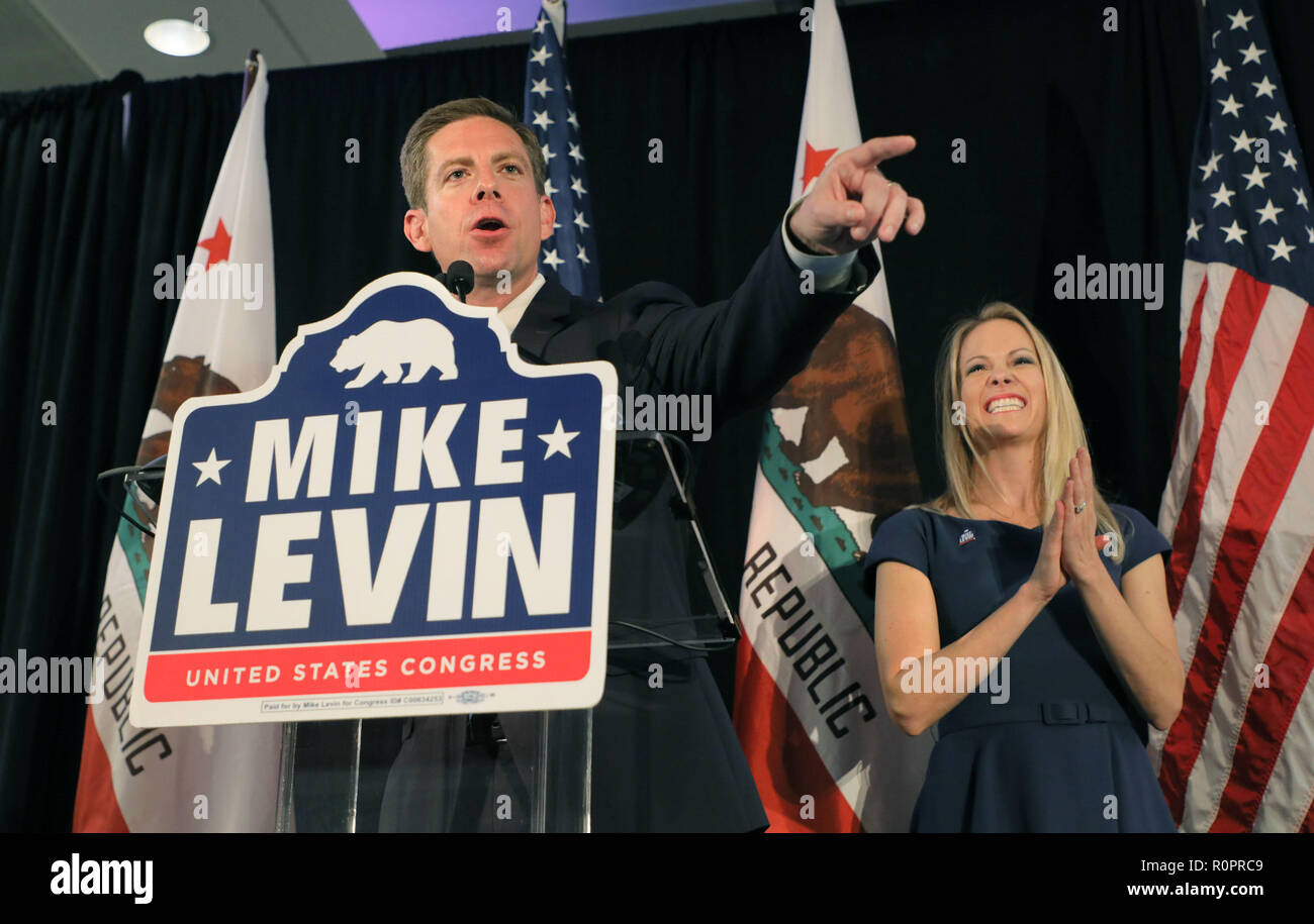 Del Mar, California, USA. 7th Nov, 2018. November 6, 2018 Del Mar, California | Congressional candidate Mike Levin, with his wife Chrissy, speaks at his victory rally at the Hilton Hotel in Del Mar, CA. | Photo Credit: Photo by Charlie Neuman Credit: Charlie Neuman/ZUMA Wire/Alamy Live News Stock Photo