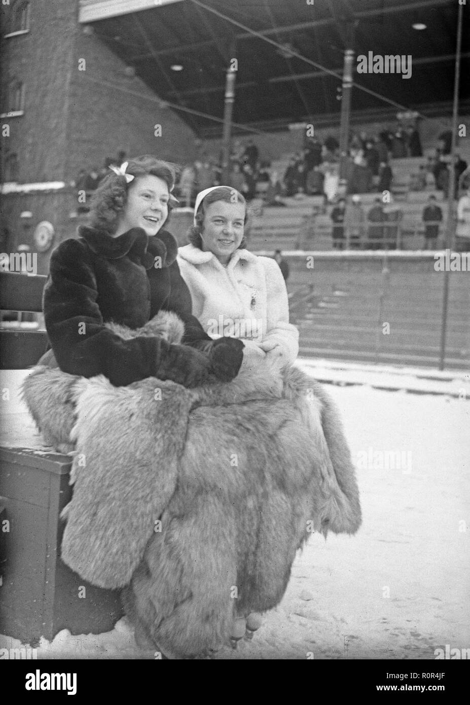 Ice skater Maj-Britt Rönningberg , 1923-2001 , swedish professional ice skater. Here on a cold winters day keeping warm under large fur coats.  Sweden February 11 1940.Photo Kristoffersson 59-1 Stock Photo