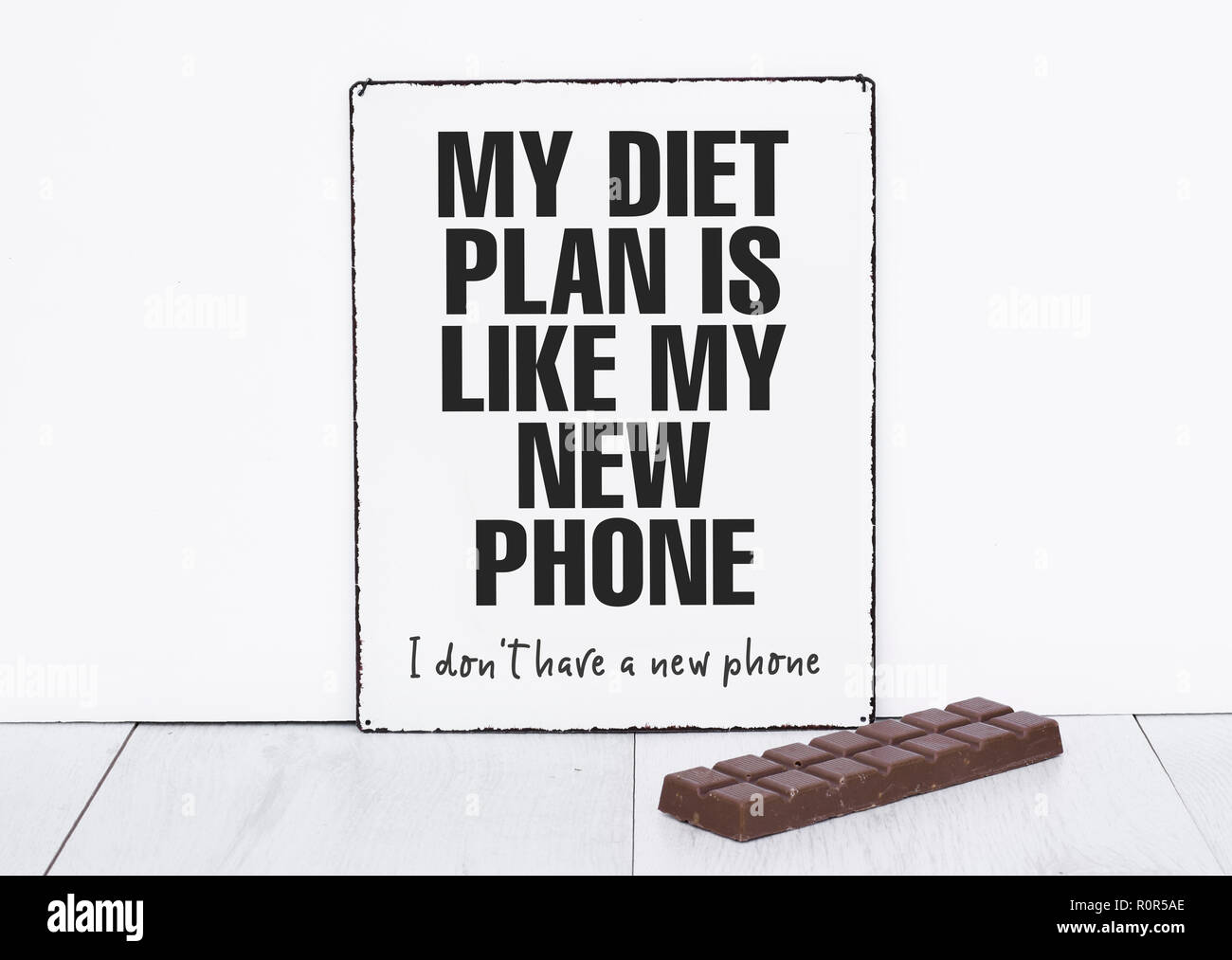 My diet plan is like a new phone dont have funny quotes about dieting  unhealthy lifestyle and love for food Stock Photo - Alamy