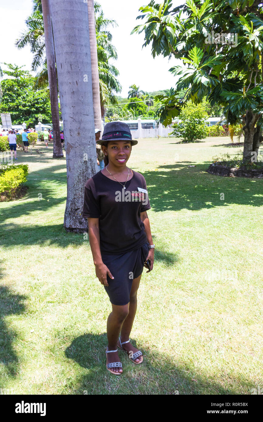 Falmouth, Jamaica - May 02, 2018: Female tour guide standing at park at Falmouth, Jamaica on May 02, 2018 Stock Photo