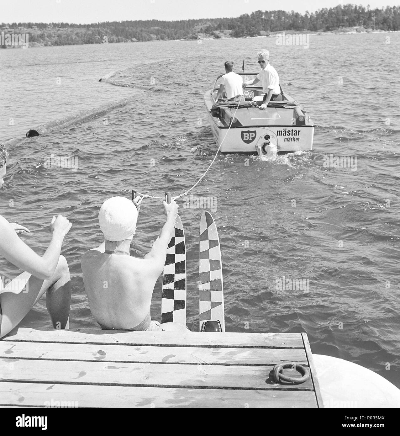 Waterskiing in the 1960s. A young woman is going  waterskiing. Sweden June 1960 Stock Photo