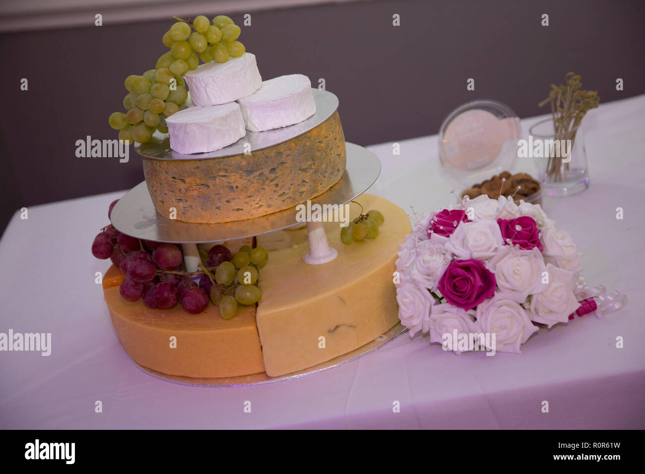triple layered cheese cake on a wedding day Stock Photo Alamy
