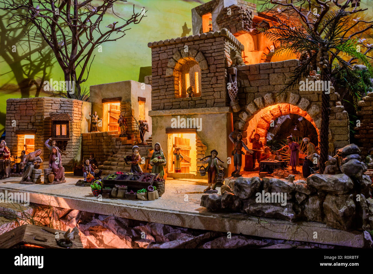 Miniatures on Christmas manger relating the history and recreating the ...