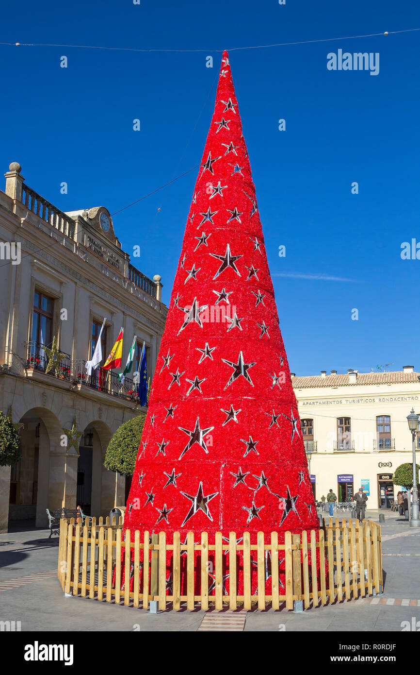 RONDA, SPAIN - DECEMBER 14, 2017: New Year tree in the center of Ronda near famous Prador de Ronda hotel Stock Photo