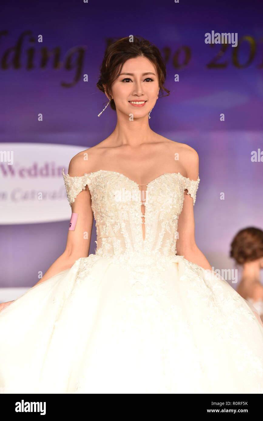 Model showcase wedding gowns during a catwalk show of Hong Kong Wedding Expo 2018 at Hong Kong Convention and Exhibition Centre. (Wedding gowns designed by Beered wedding H.K. studios) Stock Photo