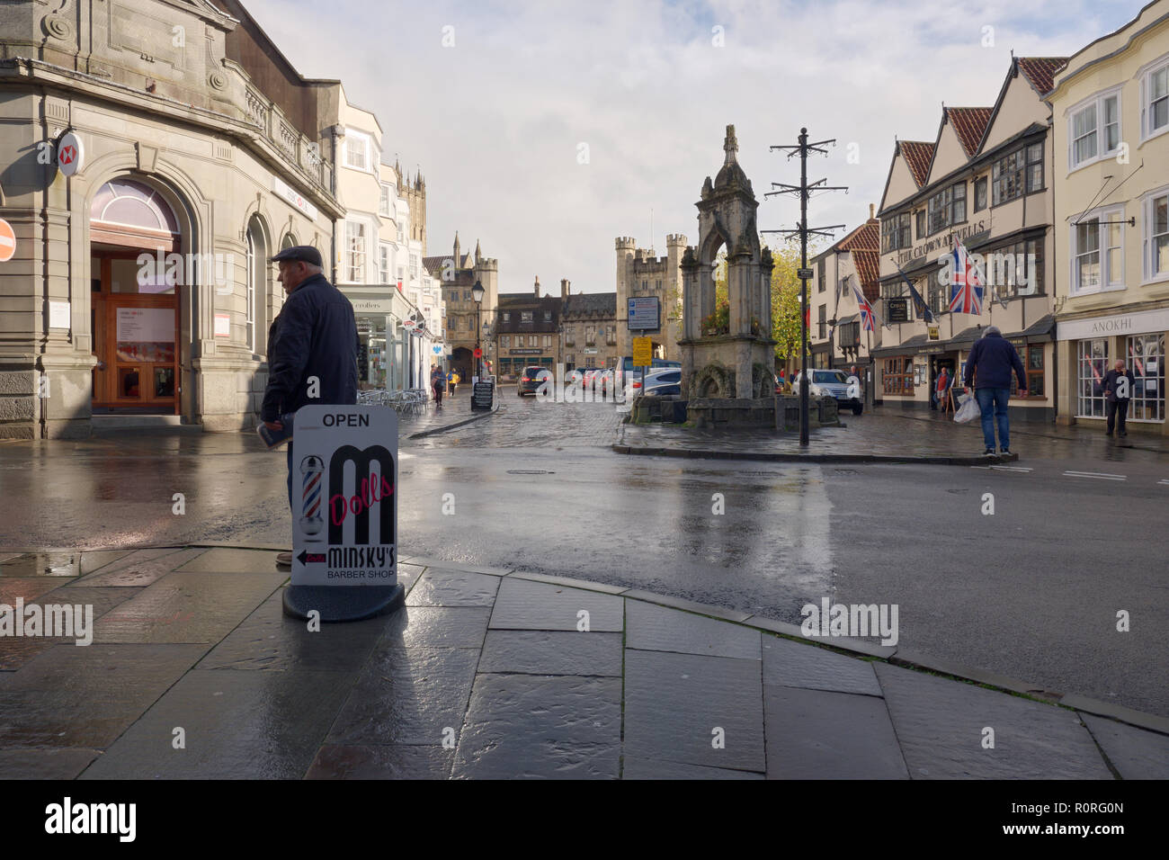 View of Market Place after a rain on high-street in Wells, Somerset, UK Stock Photo