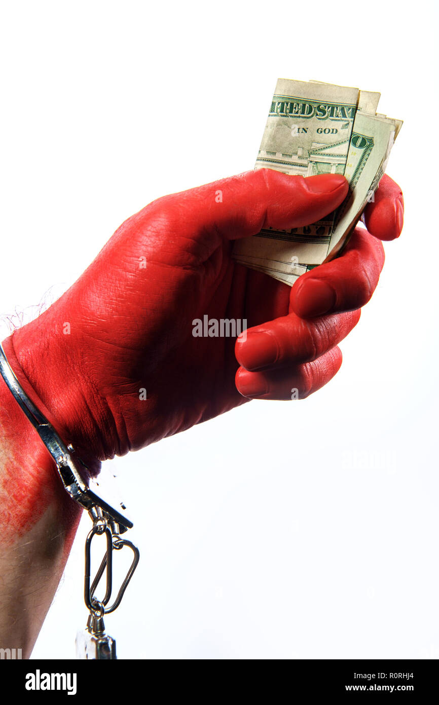 Caught red handed hand painted red wearing handcuffs concept Stock