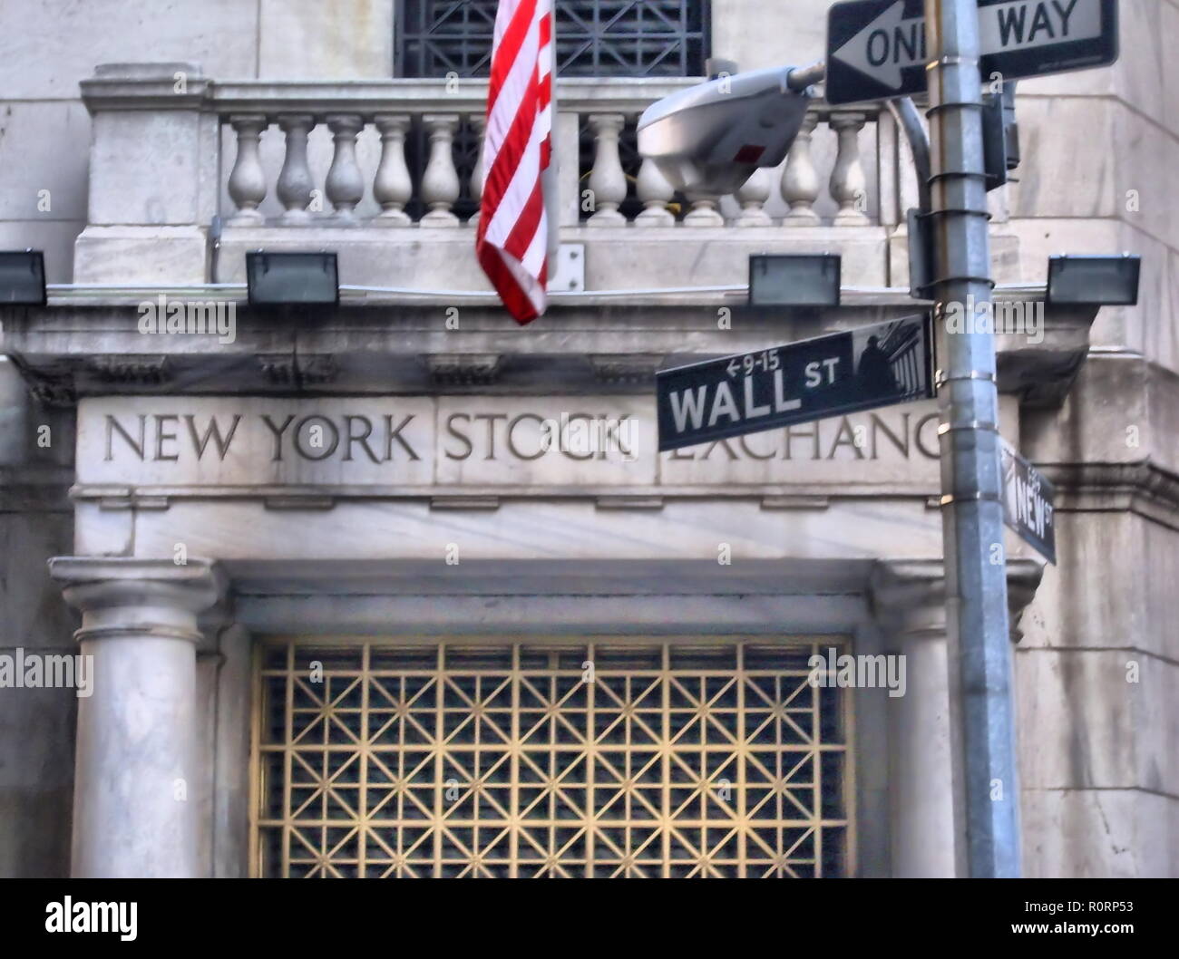 Wall street New York Stock Exchange with American flag Stock Photo