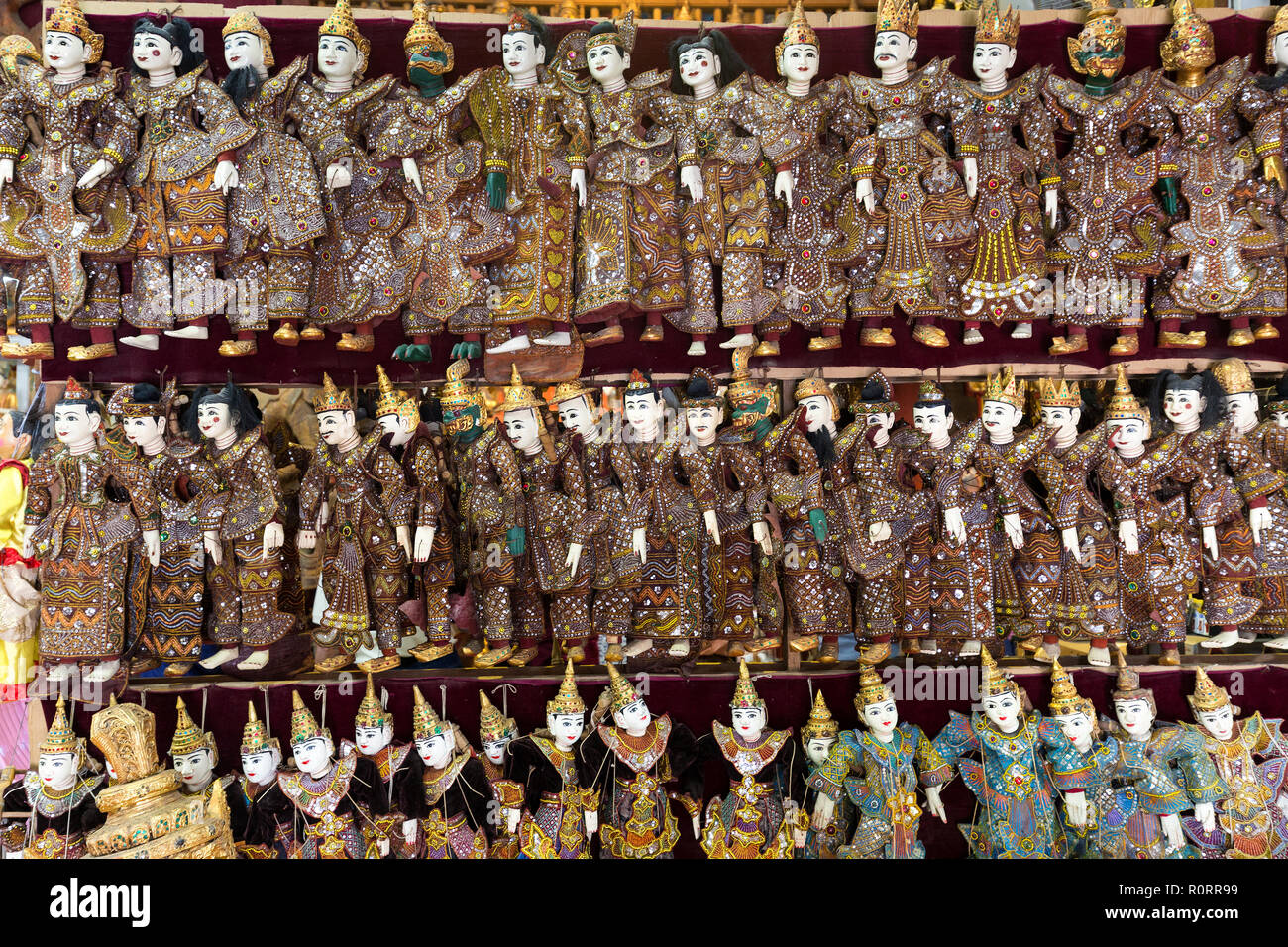 Rows of traditional Burmese puppets called 'Yoke the' , Myanmar Stock Photo