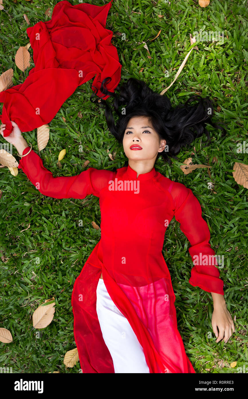 Woman in a red top hi-res stock photography and images - Alamy