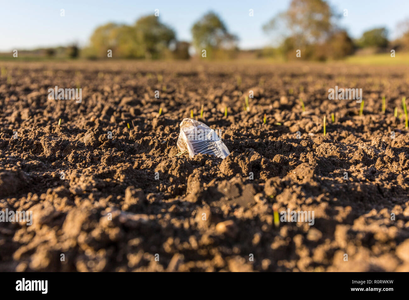 Bar code in a cultivated field. Suffolk, UK. Stock Photo