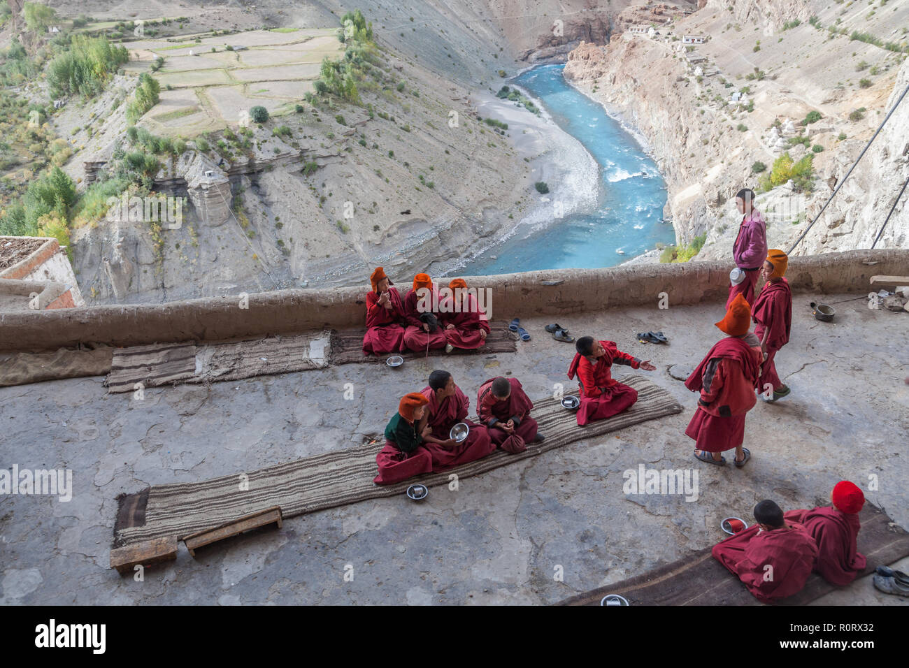 Group of young Buddhist monks in Phugtal Gompa (also known as Phuktal Gompa), Zanskar, Jammu and Kashmir, India Stock Photo