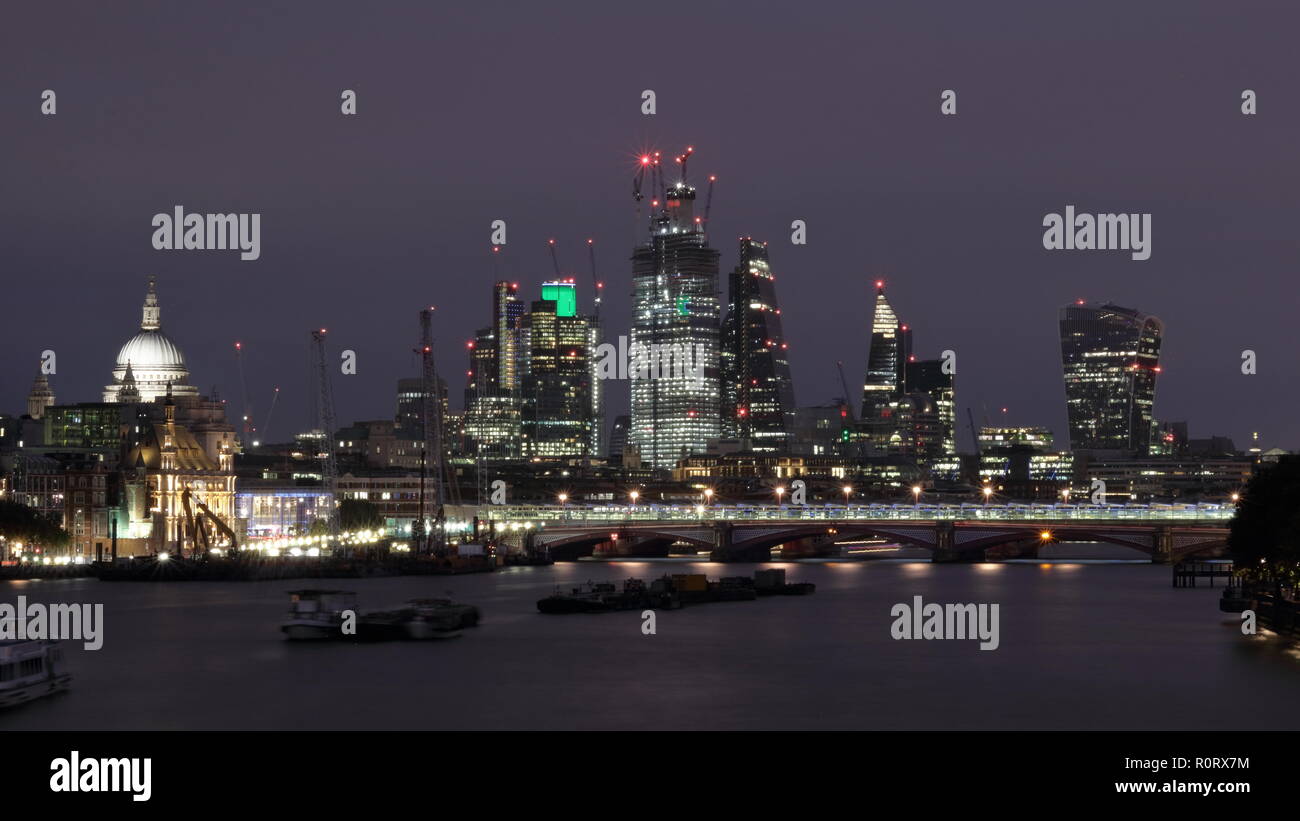 Night London capture of Canary Wharf Banks area. Image taken from the bridge. Stock Photo