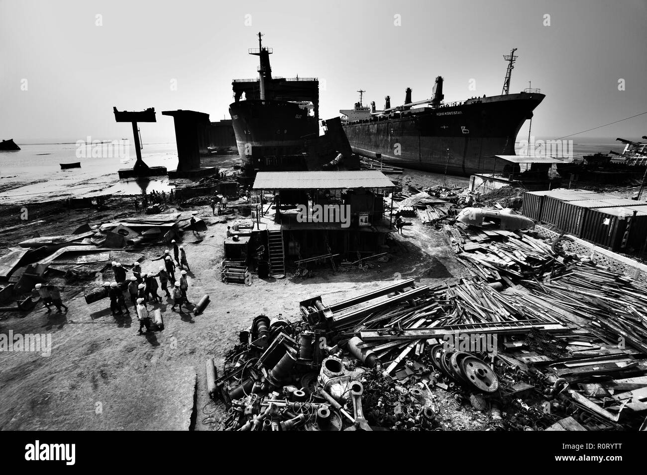 Labourers  work at ship- breaking yard. Bangladesh is dependent on ship-breaking industry for 80% of its steel needs. Chittagong, Bangladesh. Stock Photo