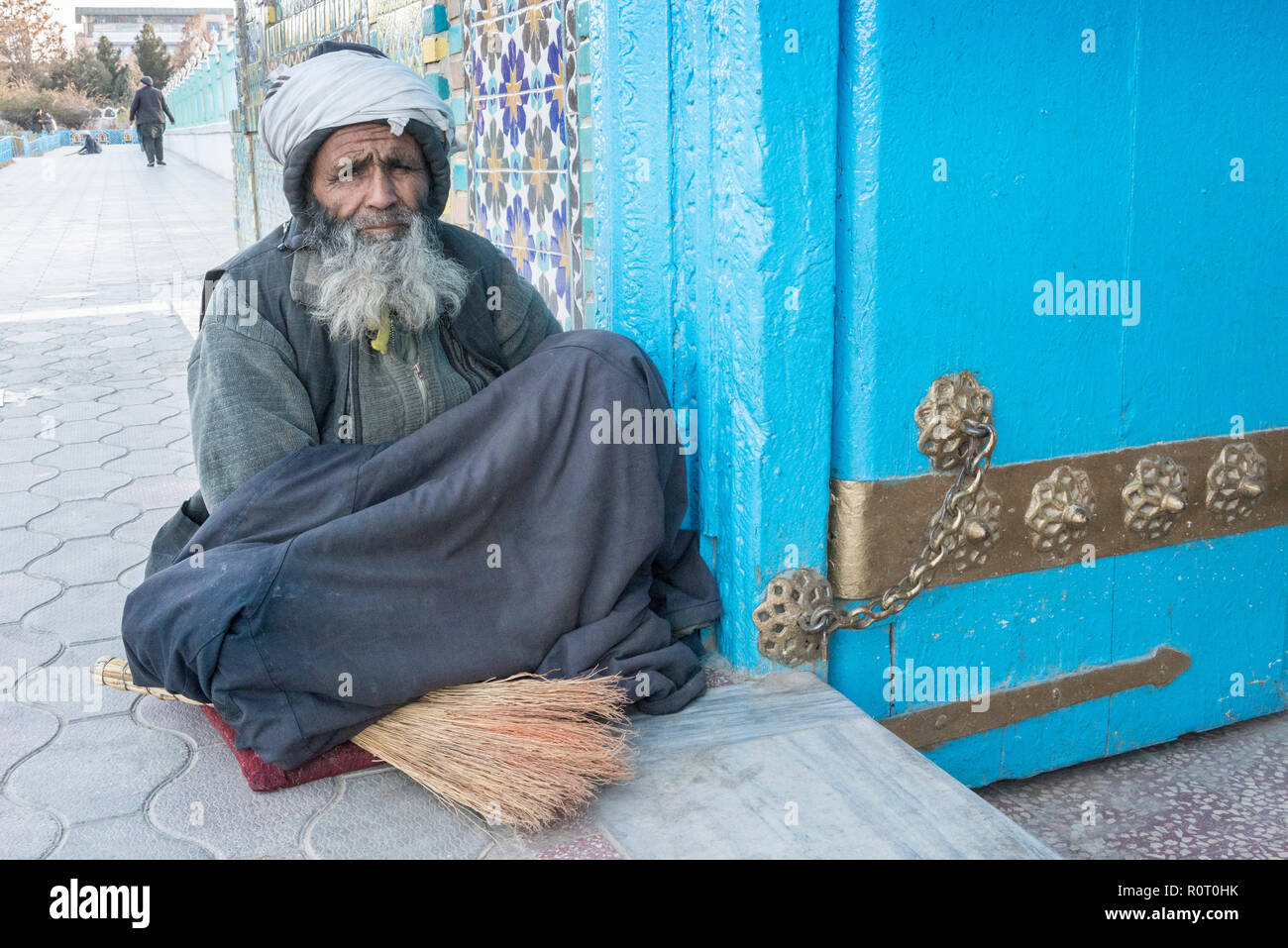 Sweeper At The Entrance Of The Shrine Of Hazrat Ali, also called the ...