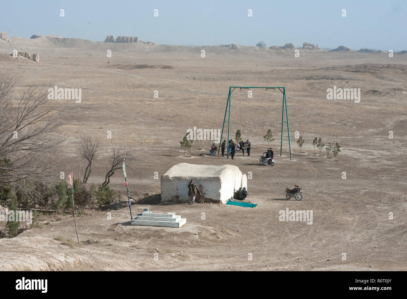 Smoking Den With A Swing Nearby In The Middle Of A Desert Landscape, Old Balkh City, Afghanistan Stock Photo