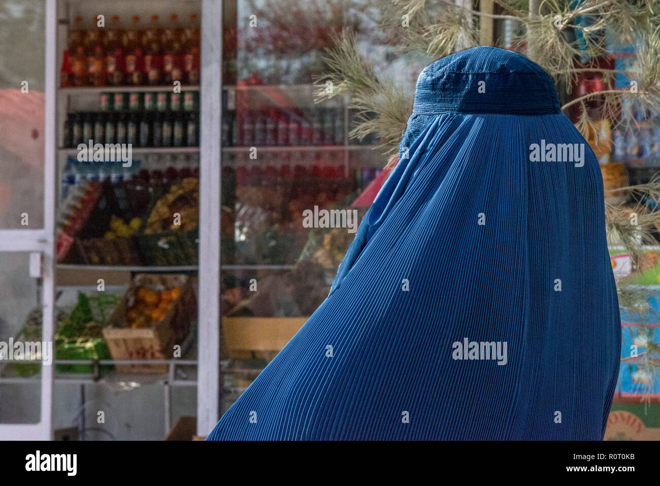 Woman Shopping With Traditional Burqa, Balkh Province, North Afghanistan Stock Photo