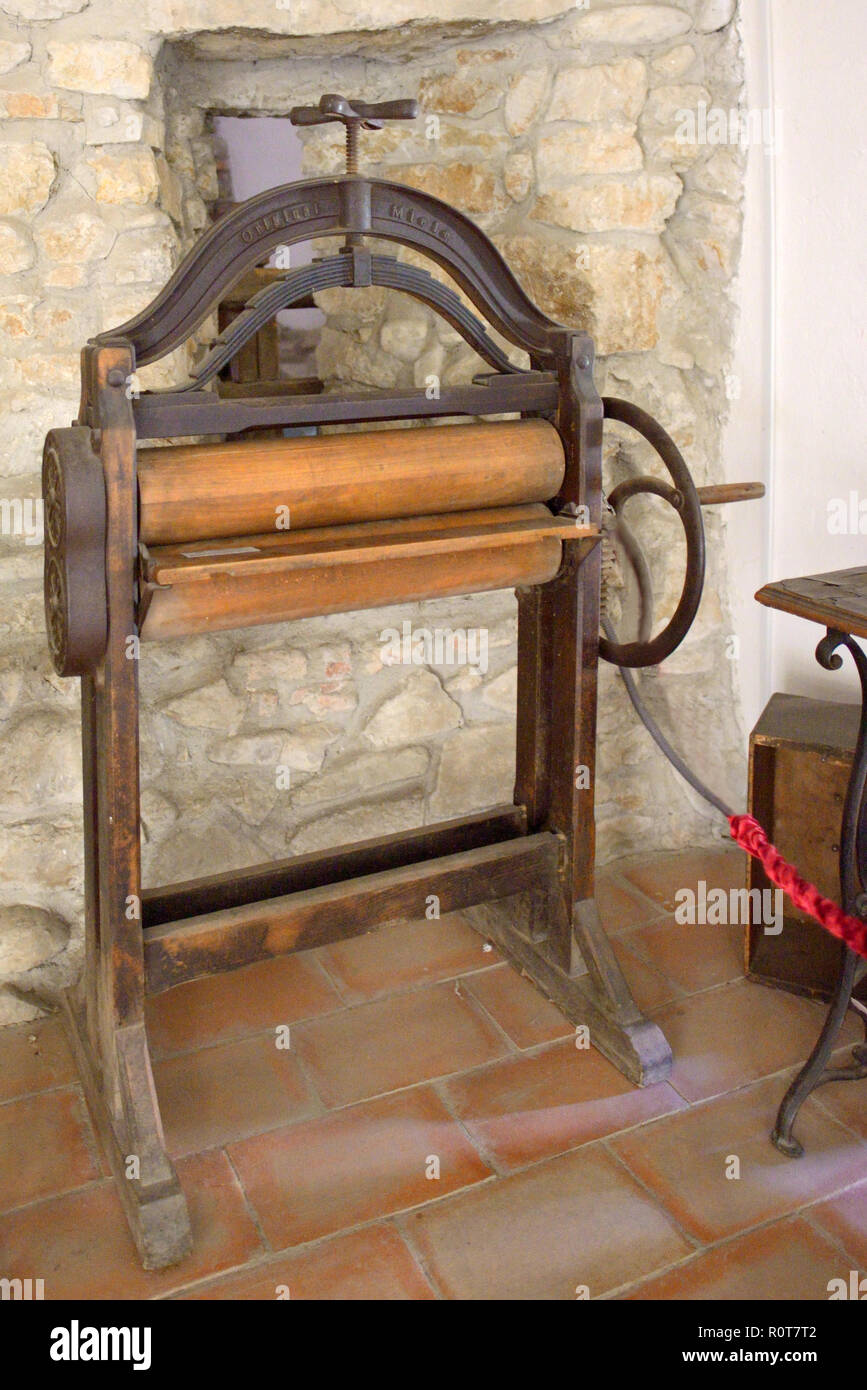 German Miele Antique wringer washer in the Saxon Fortified church of Prejmer, Brasov, Romania 04.11.2018 Stock Photo