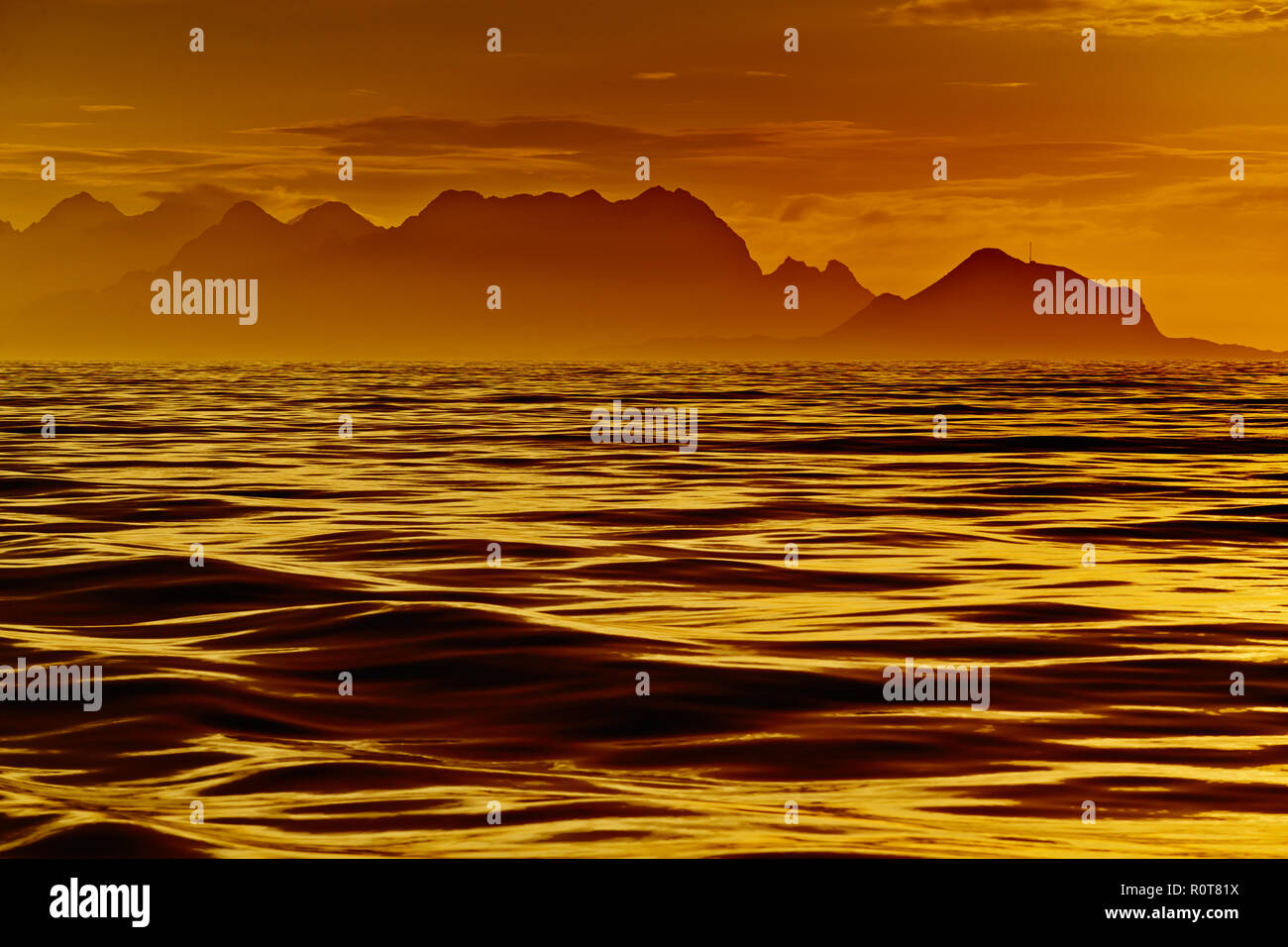 Golden Sunrise In Norway Water Sea Waves Mountains Landscape Stock