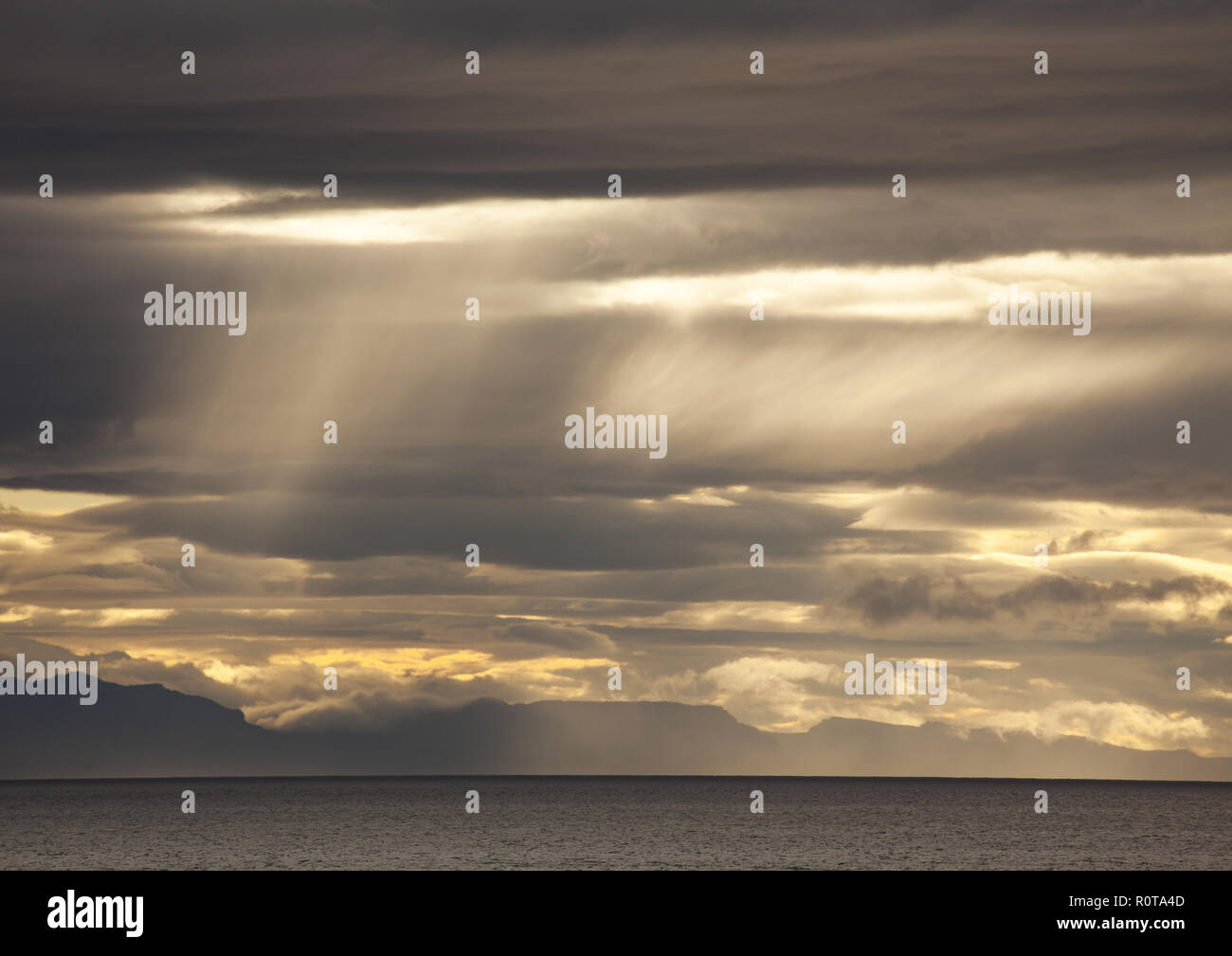 Gewitterwolken ueber dem Meer, Island Stock Photo