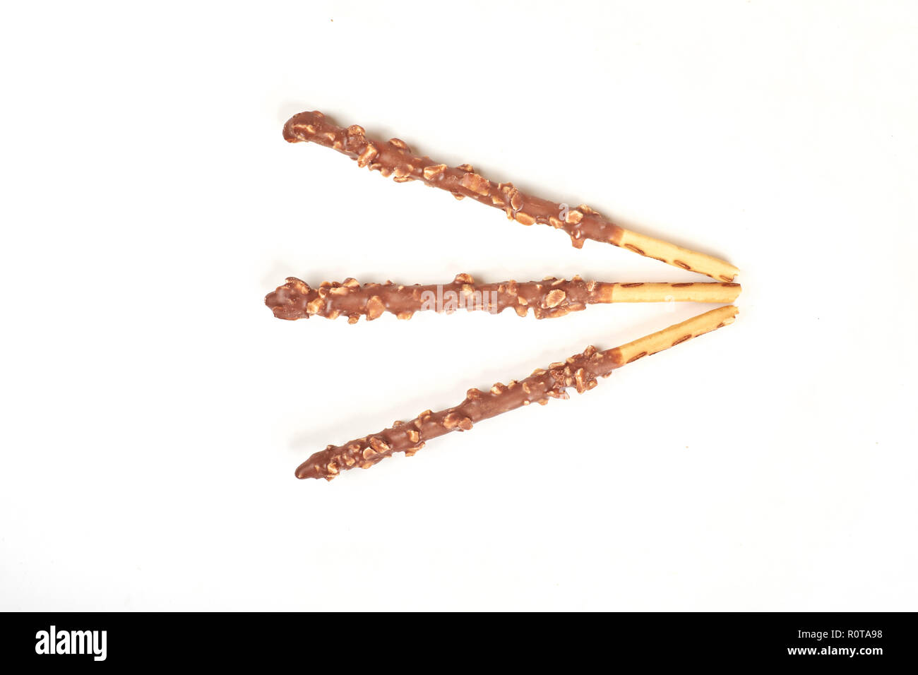 Biscuit stick with chocolate and almond on white background. Stock Photo