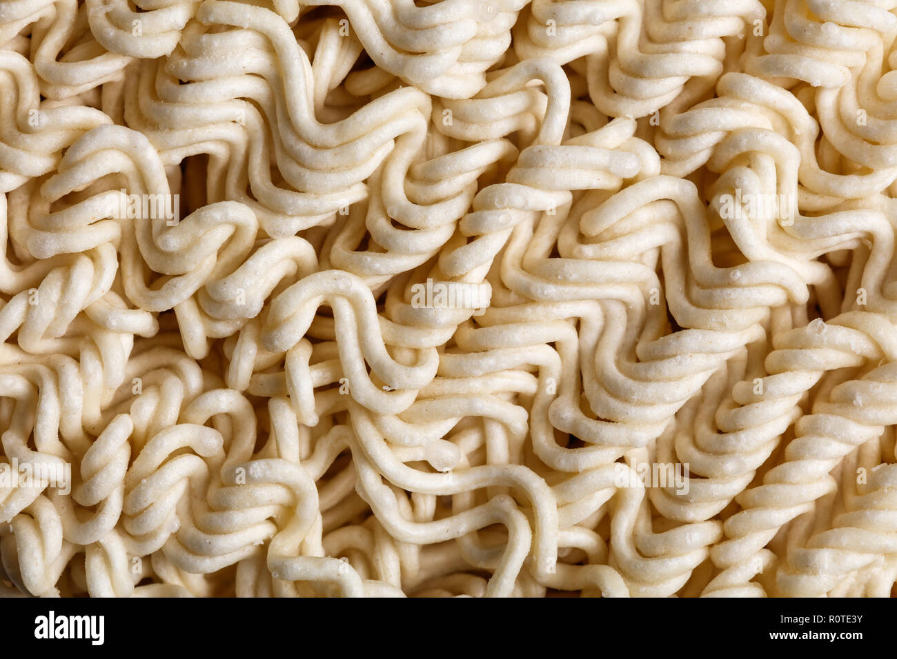 dry fastfood noodles for background, close up. Stock Photo