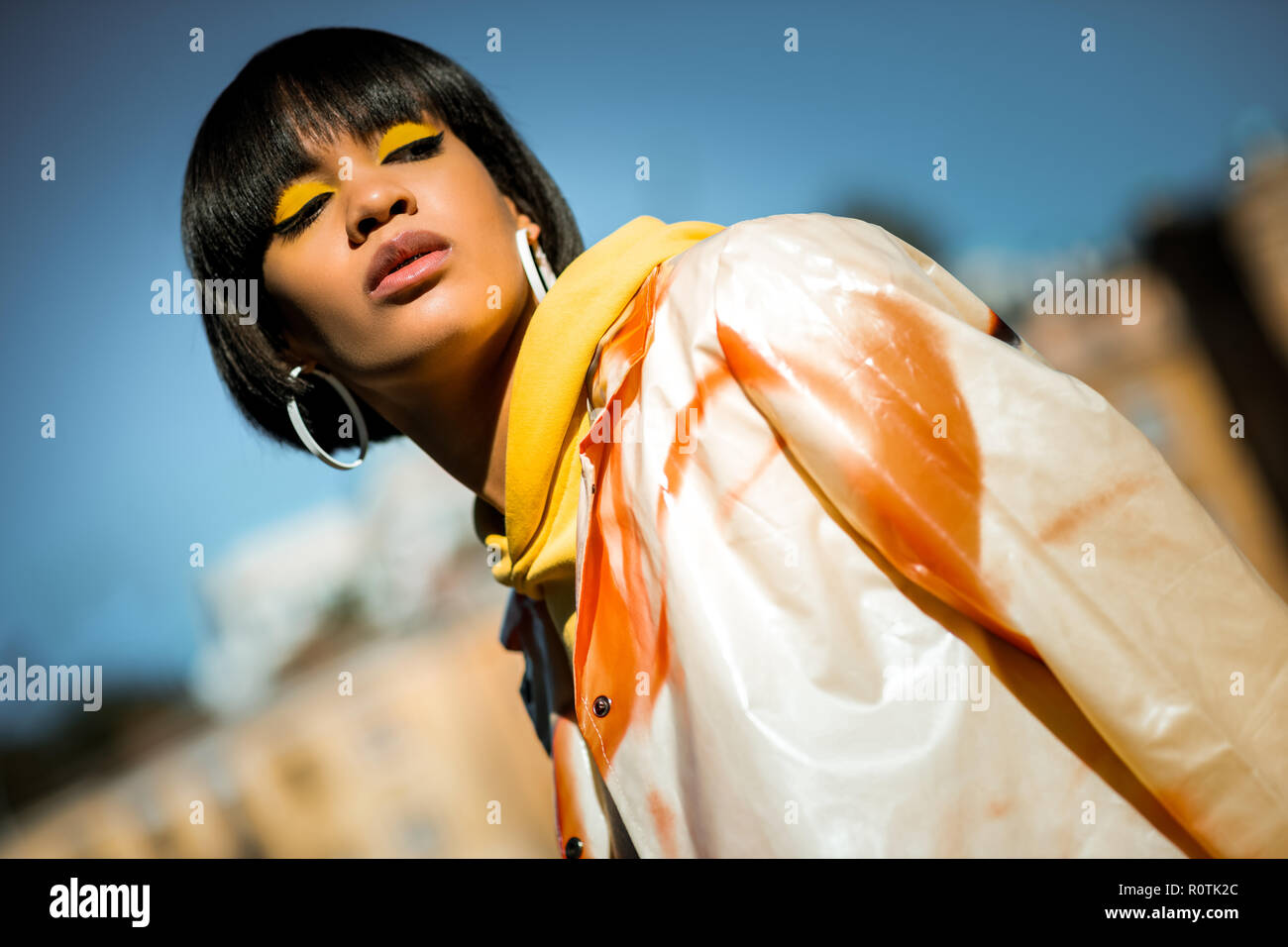Tall lady in orange hi-res stock photography and images - Alamy