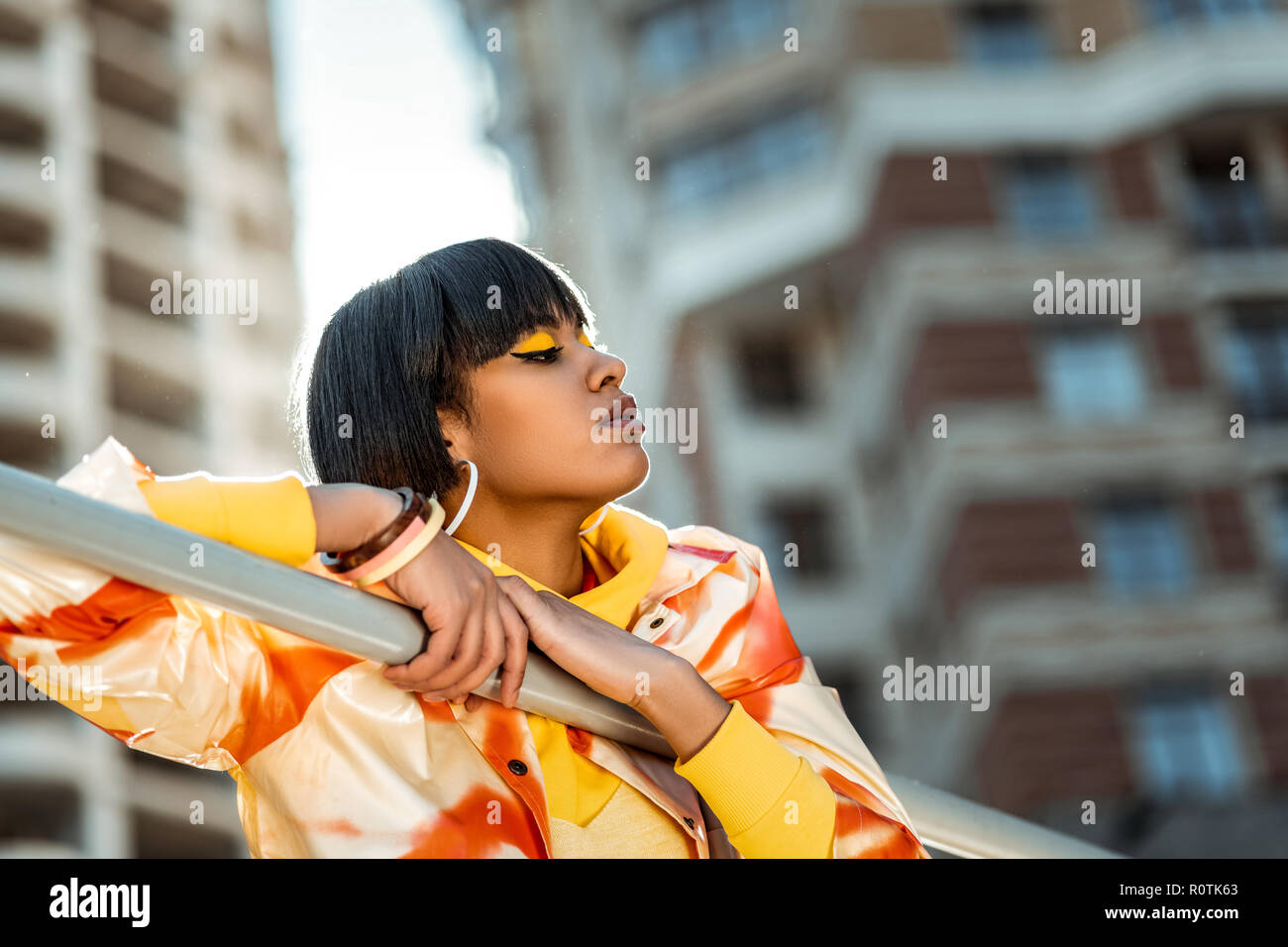 Short-haired eastern appearance woman displaying her soft profile Stock ...