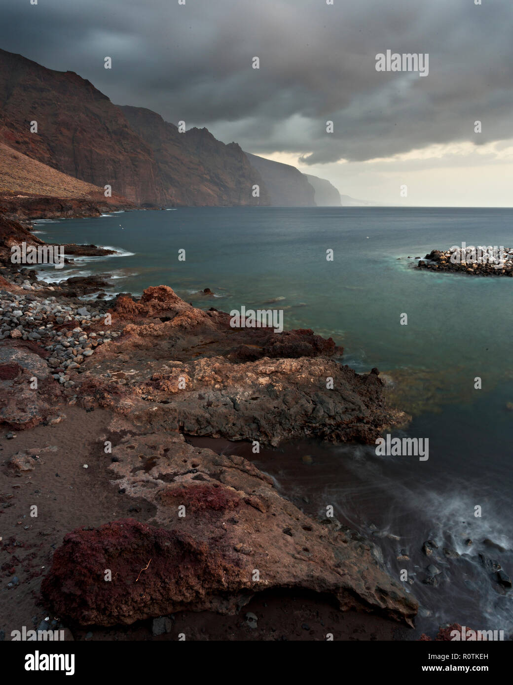 Sea cliffs at Punta de Teno on the Atlantic coast of Tenerife in the Canary Islands Stock Photo