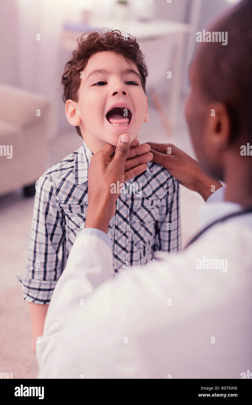 Professional Male Doctor Holding His Patient Chin Stock Photo Alamy