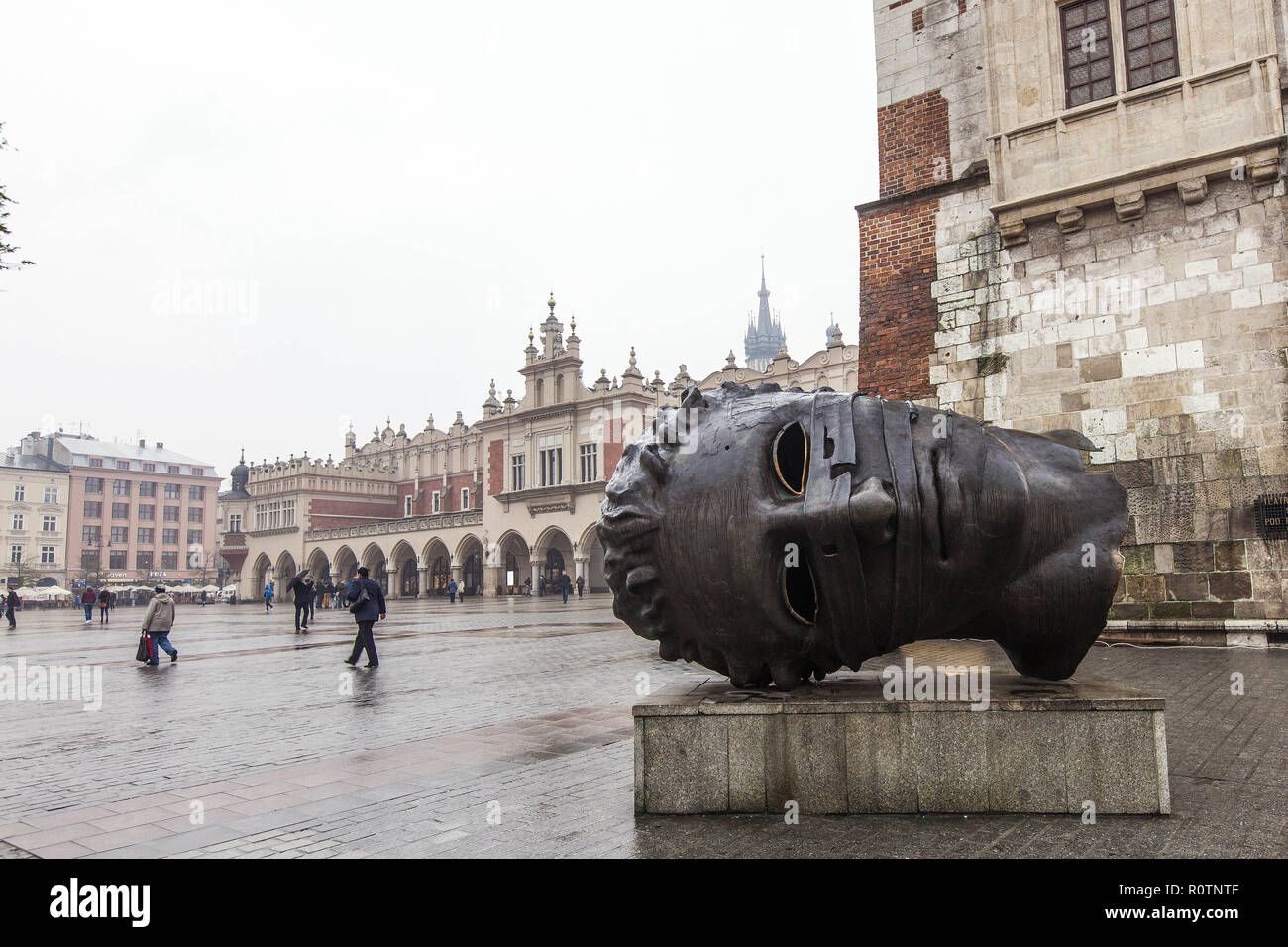The modern sculpture, named Eros Bendato (Eros Bound), located at the Town Hall Tower in Main Market Square, old town, Krakow, Poland    Photo © Feder Stock Photo