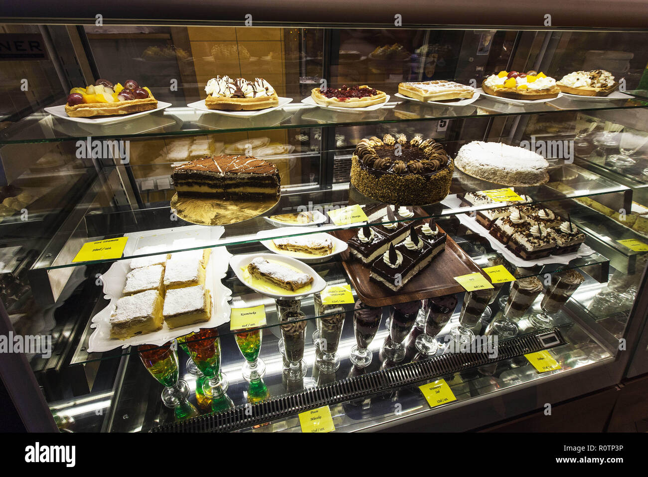 Showcase fridge with sweets and desserts in a typical restaurant, Old